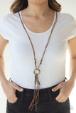 Tasseled Trinket • Brass