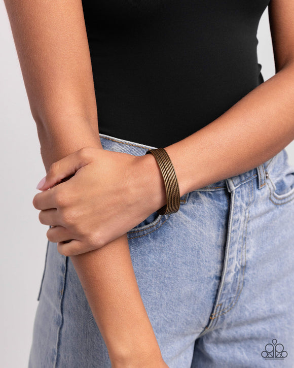 limitlessly-layered-brass