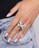 bow-caution-to-the-wind-pink