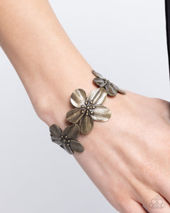 whimsical-worth-brass