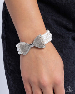 dapper-dialogue-white