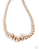 model-maverick-gold
