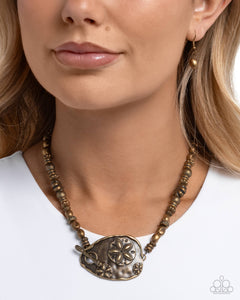 sand-dollar-statement-brass