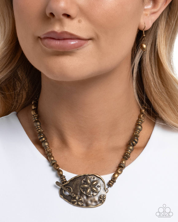 sand-dollar-statement-brass