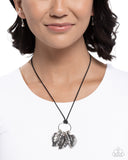 loaded-with-leaves-black