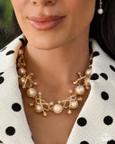 poised-promenade-gold