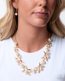 poised-promenade-gold