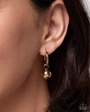 round-reveal-gold
