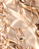 Sculptural Shimmer • Gold