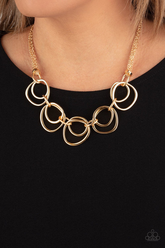 Asymmetrical Adornment • Gold
