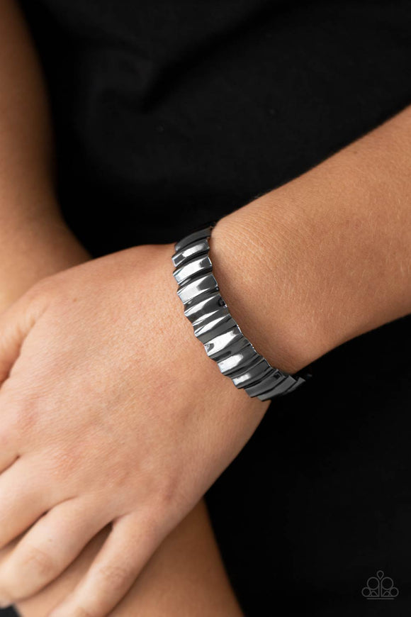 Across The HEIR-Waves • Gunmetal