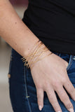 strike-out-shimmer-gold