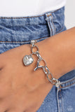 guess-now-its-initial-white-y
