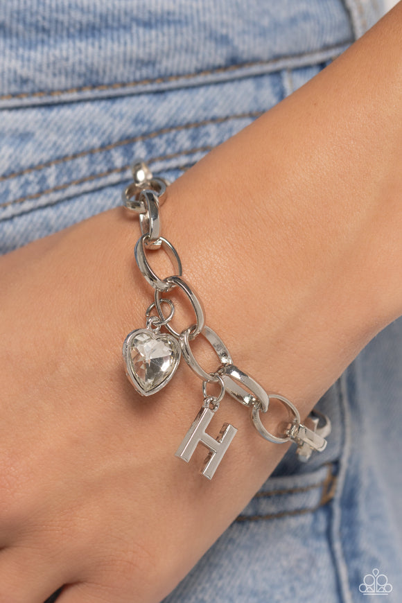 guess-now-its-initial-white-h